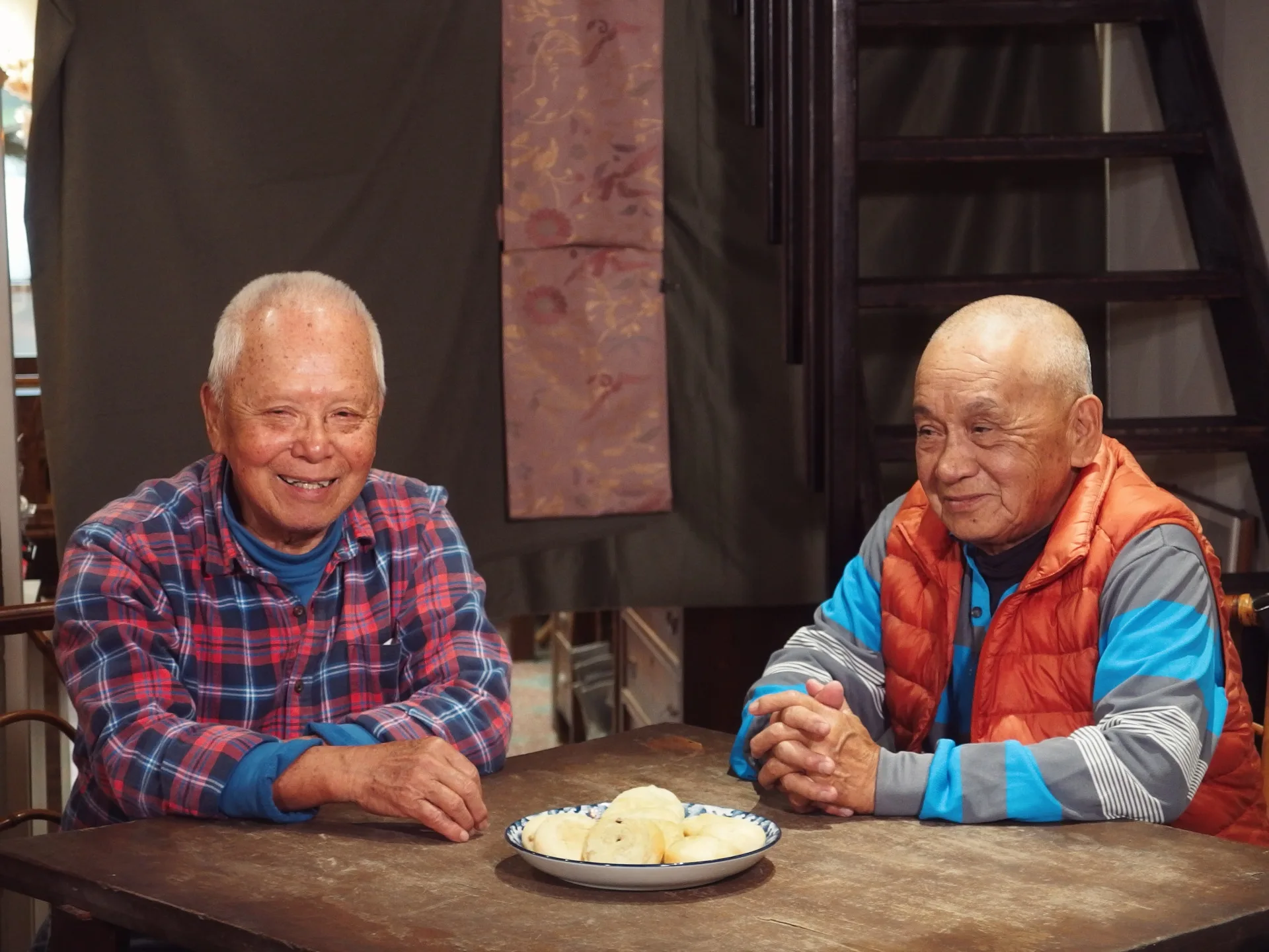 春富、黃春生兩兄弟,一生相扶持至今仍是家族的支柱。李翊彤攝
