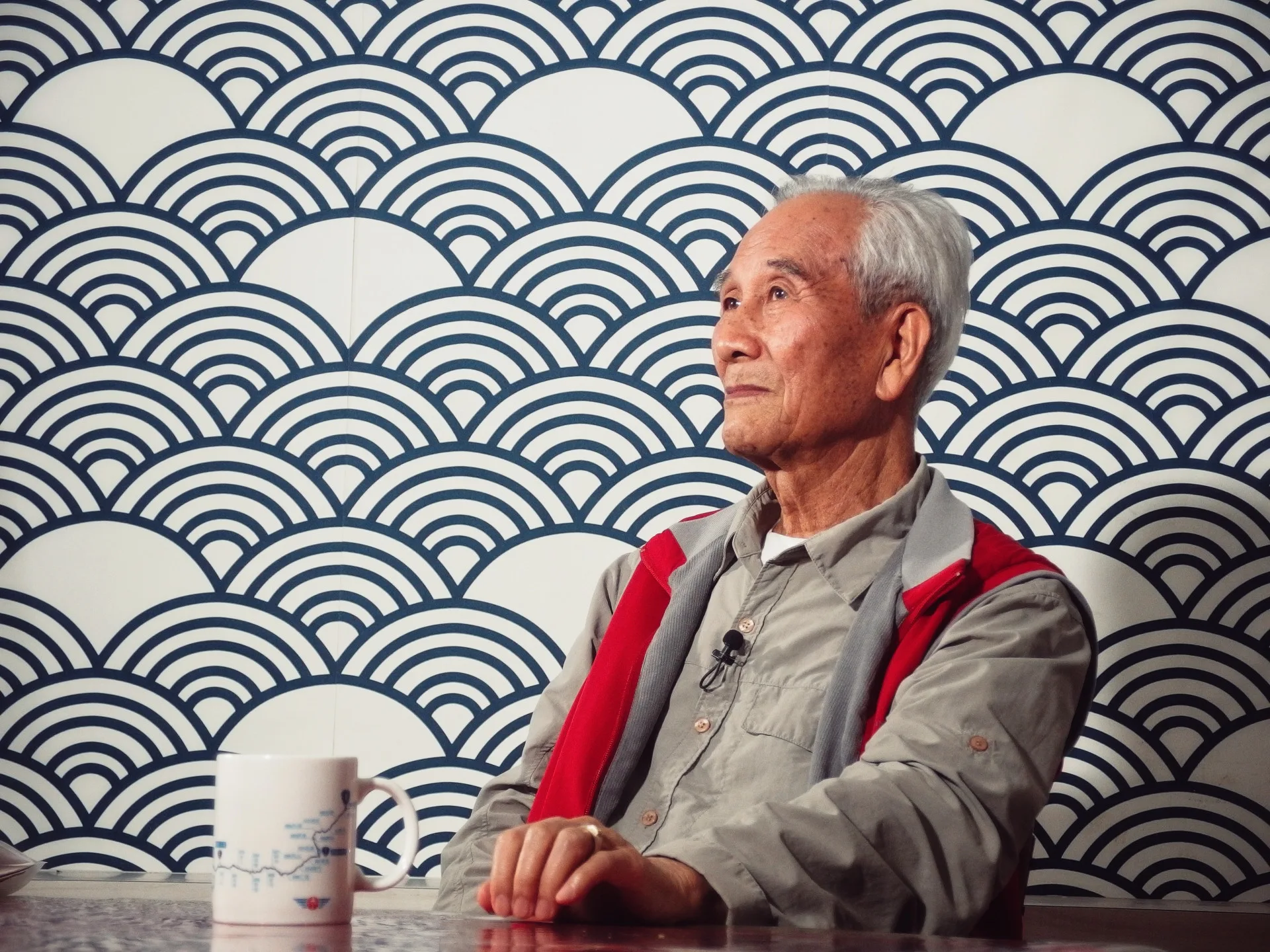 想起當年築路的艱辛,劉老先生沉思不語。李翊彤攝