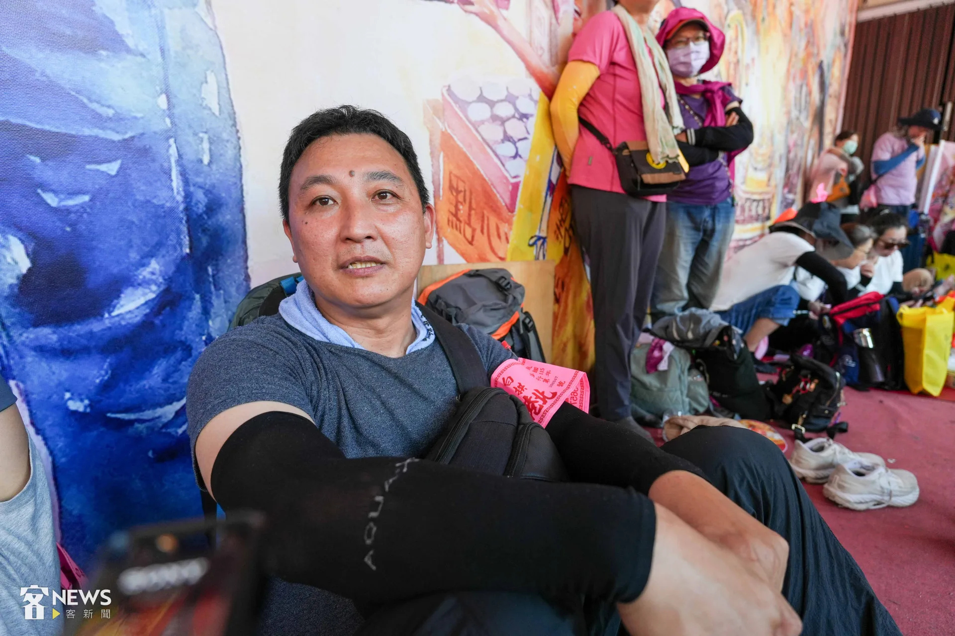 來自嘉義的周君憲已經參加白沙屯媽祖進香20幾年，他說信眾的支持相互給予很大的力量。蔡依璇攝